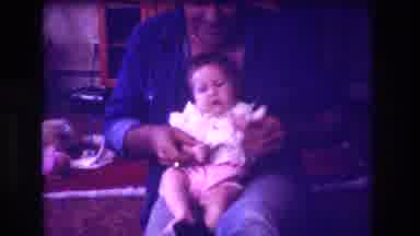 San Diego C USA (1981): A Man Playing To Make The Baby On His Lap Fight
