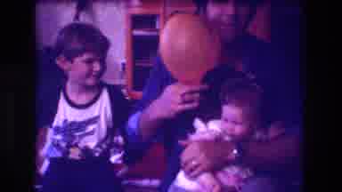 San Diego C USA (1981): Father And Son Playing With A Balloon And Their Youngest