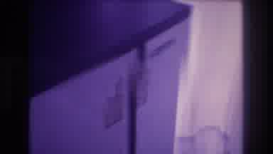 Acapulco Mexico (1982): A Man Is Opening A Mini Refrigerator Which Contains