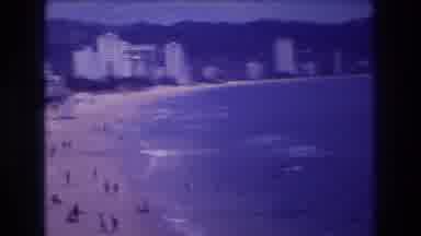 Acapulco Mexico (1982): A Beach With Lots Of Buildings/Hotels, Lots Of People,