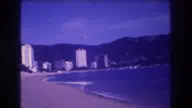 Acapulco Mexico (1982): Tall Hotel Buildings Line A Beach Along A Calm Bay