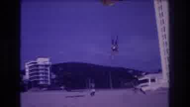 Acapulco Mexico (1982): Two Men Catch A Third Person Who Did A Parachute Drop