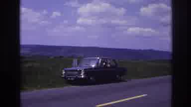 France (1967): Old Model Pickup Truck Parked By The Road While Driver Is Cleaning