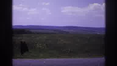 France (1967): Car Sits Idly On The Side Of The Road While Viewing Open Fields And