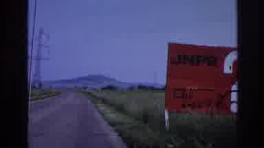 France (1967): Passenger Of Old Car Intrigued By Black Writing On Red Sign