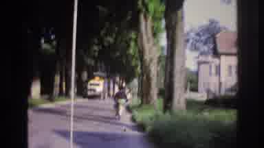 France (1967): A Man Riding His Bicycle Thru A Neighborhood And Then A City