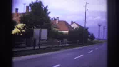 France (1967): Clip Of A Tree-Lined Street With Houses, Telephone Poles, Green