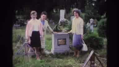 France (1967): Three Women Standing Next To A Gravestone In A Cemetery In The