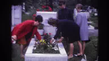 France (1967): Woman Planting Flowers On Grave Site