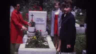 France (1967): A Group Of Women Gather At A Gravestone In A Cemetery To Mourn The