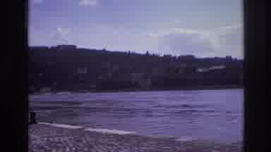 France (1967): Large Boat Is Docked Near The Shoreline Of A Small Coastal Town