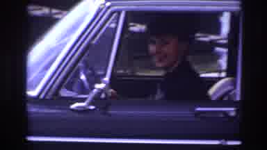 France (1967): Zoom Out From A Girl Smiling Inside A Black Car To Show A Man In