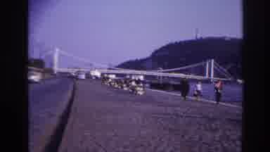 France (1967): People Enjoying Their Day Walking And Driving Along The Water