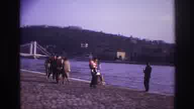 France (1967): Father And Child Walk Down Busy Sandy Beach On The Waterfront