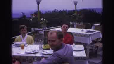 France (1967): Man Serving Food To Three People At A Table Looks Like The Late 50s