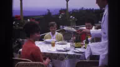 France (1967): A Man Placing A Plate In Front Of A Woman