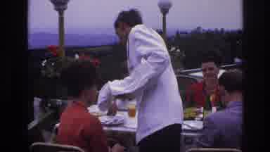 France (1967): People Sitting Down For A Meal At A Restaurant