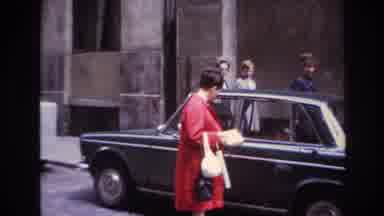 France (1967): A Woman Unlocking And Opening The Driver's Side Car Door While