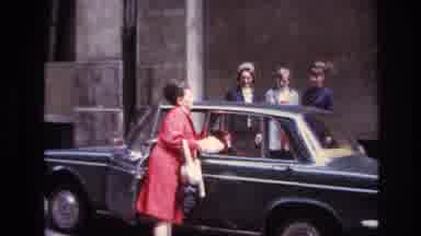 France (1967): 1960 Woman Unlocking Rear Car Door To Let Girl Friends In Without