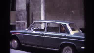 France (1967): Retro Film Of Lady In A Red Dress Trying To Open Car Door