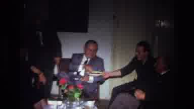 France (1967): Men Hanging Around Talking Sharing Food Visiting Sitting On The