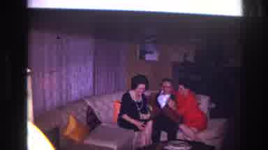 Ottawa Canada (1967): Man Sitting With Two Women Surrounding Him On The Couch