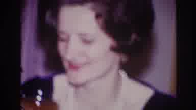 Ottawa Canada (1967): Older Woman With Dark Hair And Red Lipstick Laughs And Sips