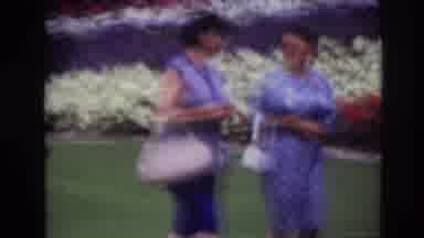 Ottawa Canada (1967): People Walking Through Memorial With Flowers In Background
