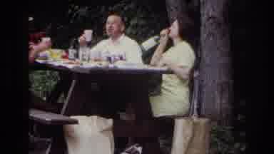 Ottawa Canada (1967): Woman Sitting At A Picnic Table Pretending To Drink Directly