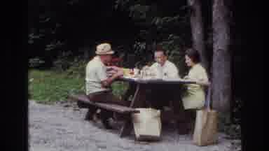 Ottawa Canada (1967): Four Adults Eat A Picnic Outdoors On A Wooden Table Food A