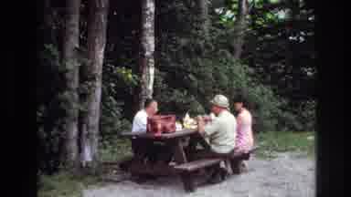Ottawa Canada (1967): Two Men And One Woman Eating Lunch On A Picnic Bench In A