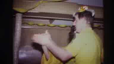Ottawa Canada-1967: A Young Couple Dancing In A Small Room With Party Streamers