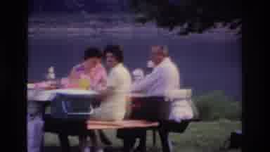 Ottawa Canada (1967): A Group Of Three People Sit Down By The Water To Enjoy A