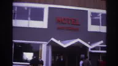 Paris France (1967): Couple Walking Out Of Front Door Motel Amsterdam Guided By