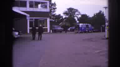 Paris France (1967): Two Men Walking Into A Building, Discussing Something; Along