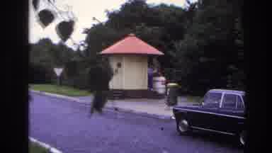 Paris France (1967): A Woman Come Walking Out Of A Tiny House Or Somewhere You