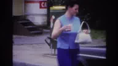 Paris France (1967): Lady Entering Her Car