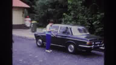 Paris France (1967): White Woman Unlocking Black Car, Rain On The Window