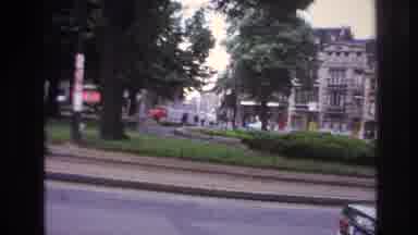 Paris France (1967): Watching The Cars Pass On A Busy City Street