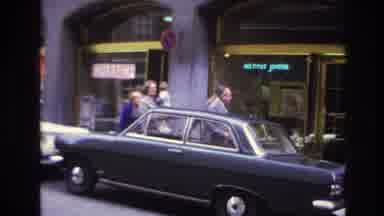 Paris France (1967): Family Walking Down The Street Looking For A Specific Store