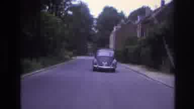 Paris France (1967): Driving Behind A Classic Volkswagen Beetle