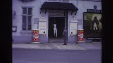 Paris France (1967): Guardian Watches The Entrance And Lady Posing