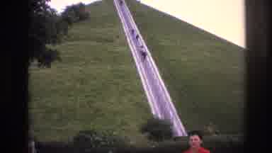 Paris France (1967): Woman In Red Walks Up To A Set Of Steep Stairs Leading Up A