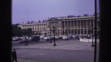 Paris France (1967): Many Cars Traveling On An Avenue, People Talking And Walking
