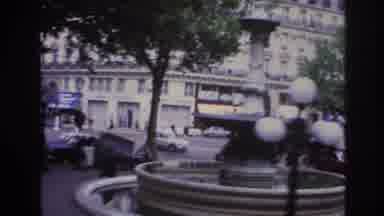 Paris France (1967): A View Of A Large Fountain In A Busy City Downtown