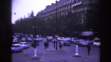 Paris France (1967): Vintage Cars Swiftly Driving Through Town Back In The Day