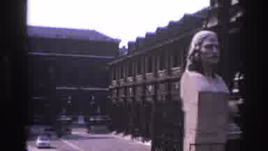 Paris France (1967): Tourist Passing Old Ornate Building With Statues Of Men
