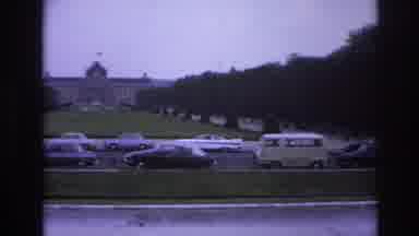 Paris France (1967): Several Cars Parked In Front Of A Large Building Near A Wide