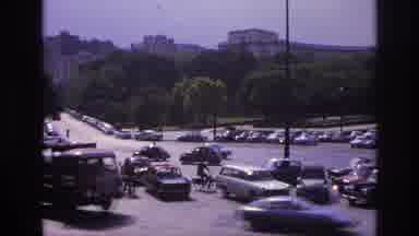 Paris France (1967): Active City Street With Mild Traffic And Parking Space