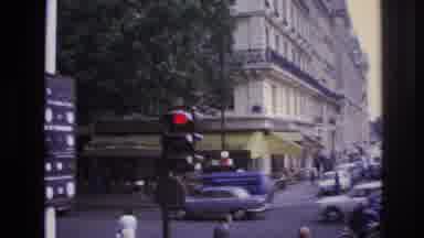 Paris France-1967: Busy Intersection With Vintage Cars And Old Fashioned Traffic